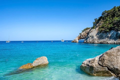 Light blue clear sea on a dream beach on Cala Goloritzé, picturesque rocky coast, cliffs with rock