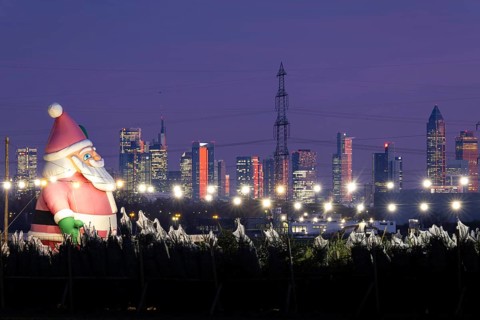 In a Christmas tree center near Frankfurt am Main, a multi-metre-high inflated figure of Santa