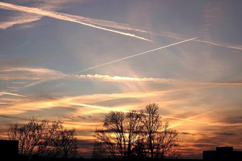 Picturesque evening sky with contrails, autumn, Germany