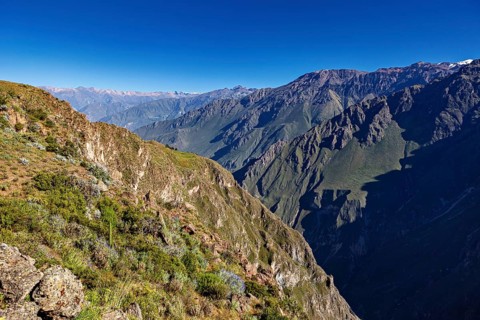 Clear sky with a wide panorama of mountains and deep gorge, The mountains and valleys of the Colca