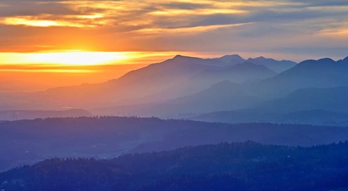 View of the Jura foothills from the Gisliflue, in the light of the setting sun, Talheim, Canton,