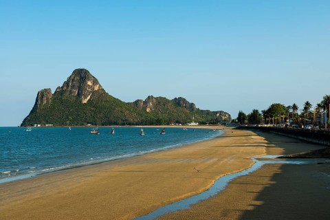 Lonely sandy beach and mountains, sunset, Prachuap Khiri Khan, Prachuap Khiri Khan Province,