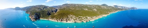 Panorama, picturesque rocky coast, cliffs and Cala Luna beach, aerial view, Golfo di Orosei,