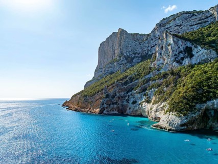 Picturesque rocky coast, cliffs and turquoise blue sea, aerial view, Golfo di Orosei, Baunei,