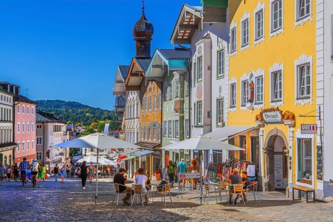 Historic market street with street cafe and typical gabled houses, Bad Tölz. Isartal, Upper