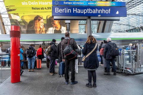 Central Station in Berlin, passengers on the platform, train arrives, Germany