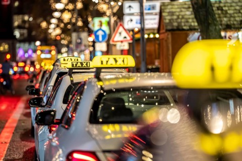 Taxi stop, on Tauentzienstraße in Berlin, in the evening, Germany
