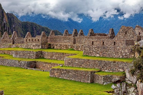 Ruins of Machu Picchu with clear contours against a cloudy sky, The ruins of the Inca city of Machu