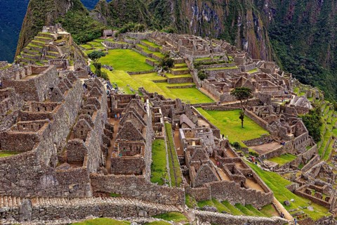 Rocky ruins and expansive terraces in an ancient setting, the ruins of the Inca city of Machu