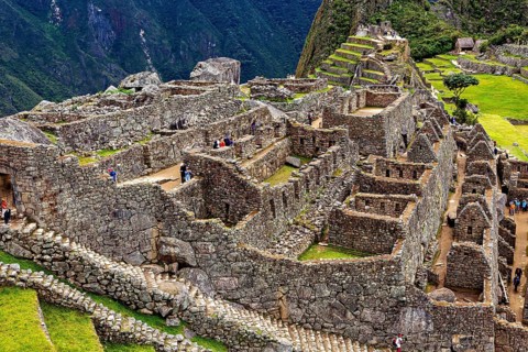 Stone Inca ruins of Machu Picchu surrounded by mountainous landscape, The ruins of the Inca city of