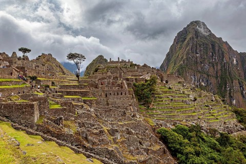 Historic ruins of Machu Picchu with impressive mountain scenery and clouds, The ruins of the Inca