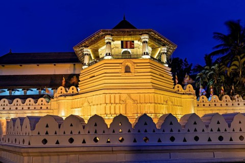 Impressive night lighting of a historic building with traditional elements, The Temple of the Tooth