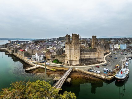 Caernarfon Castle from a drone, Caernarfon, Gwynedd, North-West Wales, UK