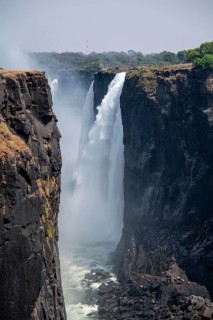 Water plunges into the depths, Victoria Falls with gorge, Zambezi, Zimbabwe