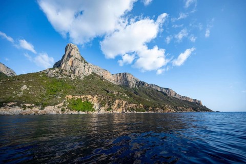 Picturesque rocky coast, cliffs and blue sea, Golfo di Orosei, Baunei, Sardinia, Italy
