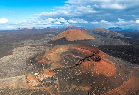 Montaña Quemada and Montaña Pedro Perico volcanoes, volcanic landscape with craters and lava