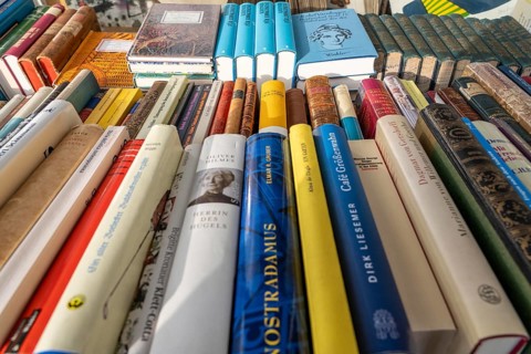 Table with partly old books, offered by a second-hand bookshop