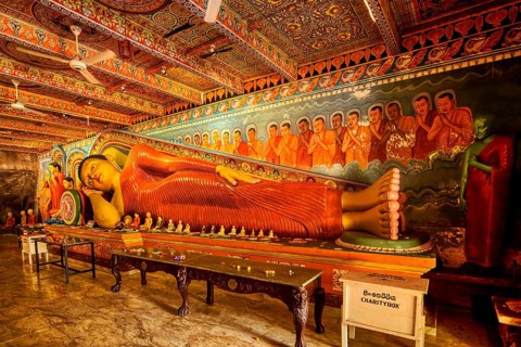 Reclining Buddha statue in Isurumuniya Rajamaha Viharaya temple, Anuradhapura, Sri Lanka