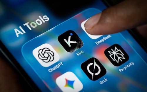 In this photo illustration, a person uses the Kimi AI chatbot on a smartphone while the KIMI logo