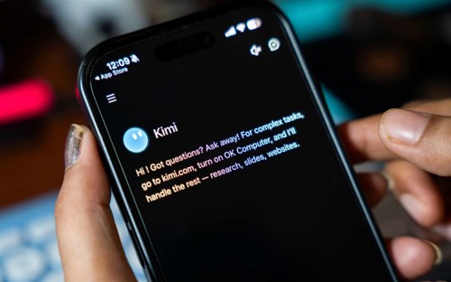 In this photo illustration, a person uses the Kimi AI chatbot on a smartphone, in New Delhi, India