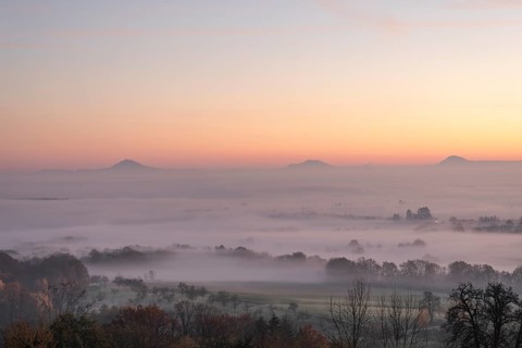 Three Kaiserberge mountains in golden morning light, Hohenstaufen, Aichelberg. Spectacular dawn