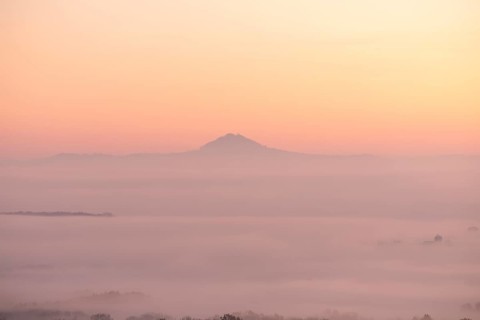 Hohenstaufen in the golden morning light, Aichelberg. Spectacular dawn over the foggy foothills of