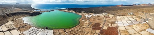 Salt mining plant, Salinas de Janubio with green Laguna de Janubio, near Yaiza, aerial view,