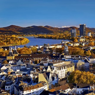 Autumn panoramic view from the town house of Bonn Minster, the Post Tower, the Rhine and the