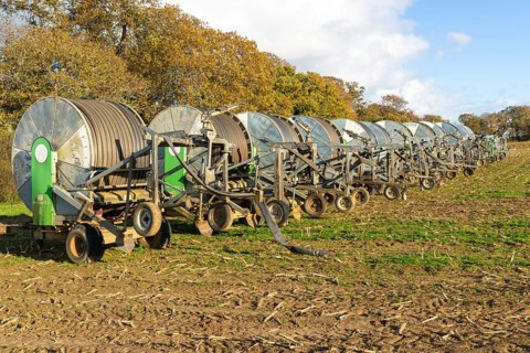 Rainstar E31 irrigation sprayer machinery in field, Shottisham, Suffolk, England, UK