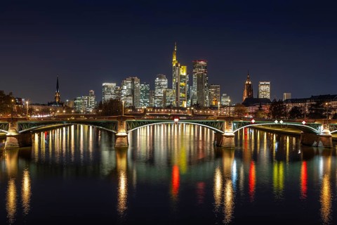 The lights of Frankfurt's banking skyline glow in the evening, Frankfurt am Main, Hesse, Germany