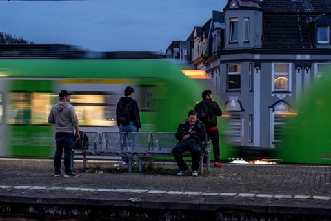 Essen-Steele S-Bahn station, passengers waiting for the train late afternoon, in autumn, Essen,