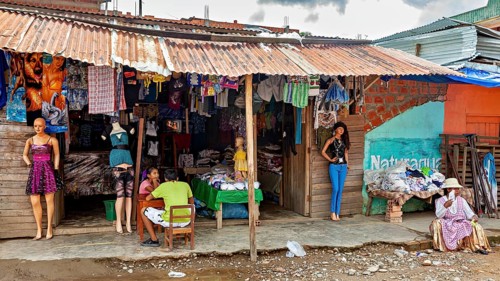 A small shop at a market with clothes and mannequins in a rural setting, The Rurrenabaque market in