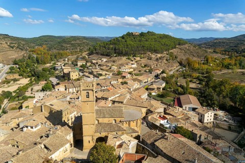 Church tower and rooftops of medieval village of Uncastillo, Cinco Villas, Zaragoza province,