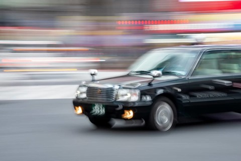 Black taxi driving, motion blur, long exposure, Shubuya Crossing, Shibuya, Tokyo, Japan
