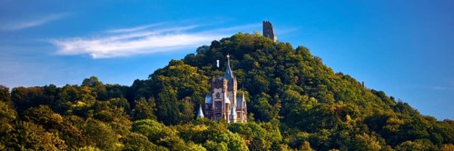 The mountain Drachenfels with Drachenburg Castle and the castle ruins, Siebengebirge, Königswinter,