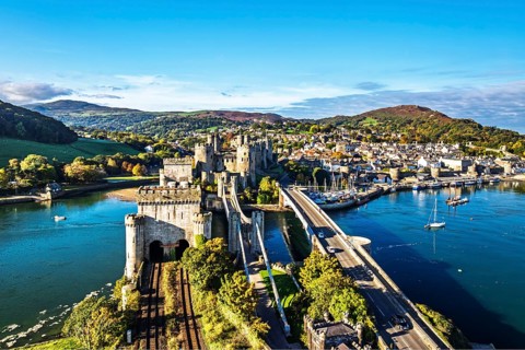 Conwy Castle over River Convy from a drone, Convy, North Wales, England, United Kingdom