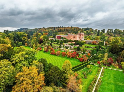 Autumn colours over Powis Castle and Garden from drone, Welshpool, Powys, Wales, England, United