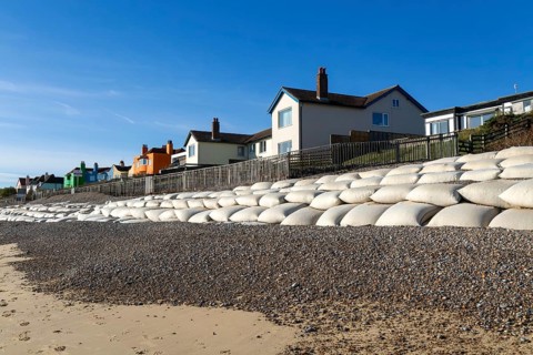 Clifftop houses at risk from coastal erosion, Thorpeness, Suffolk, North Sea coast, England, UK
