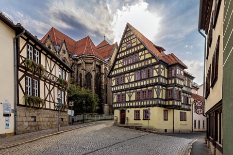 Half-timbered houses in a historic old town in sunshine and cobblestone streets, The old town of