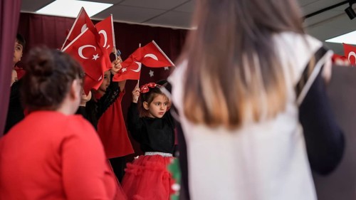 Children celebrate the 102nd anniversary of the Republic Day of Turkey, a national holiday