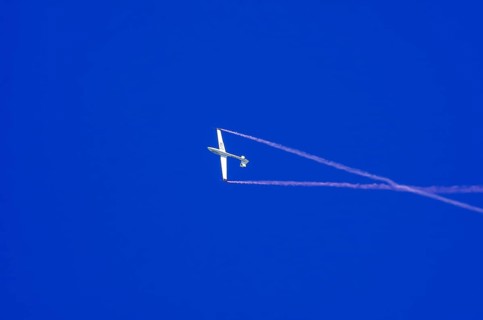 An SZD-59-1 ACRO glider, registration D-1138, during a demonstration as part of an air show at the