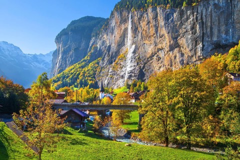 View of town and valley with Staubbach waterfall in autumn, Lauterbrunnen, Bernese Oberland, Canton