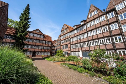 Facades of the historic brick buildings, inner courtyard, view over the city, Peterstraße,