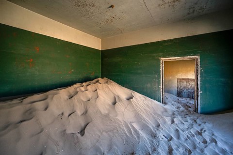 Former dwelling house full of sand, Kolmanskop, restricted diamond area, Karas region, Namibia
