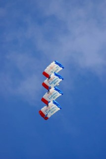 Parachutists during an aerial acrobatic demonstration as part of an air show on the Rossfeld in