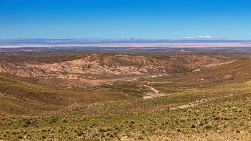 Vast desert landscape with hills and mountains in the distance, The landscape of the Altiplano in