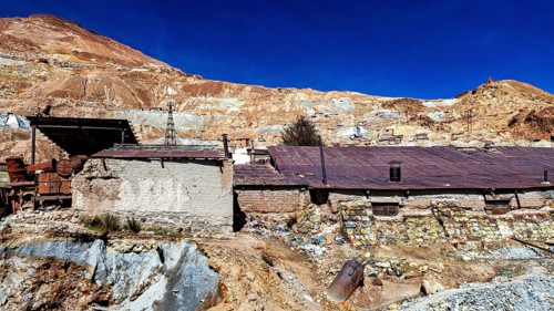 Old mine complex in desert-like surroundings with clear skies, The silver mines of Potosi Bolivia