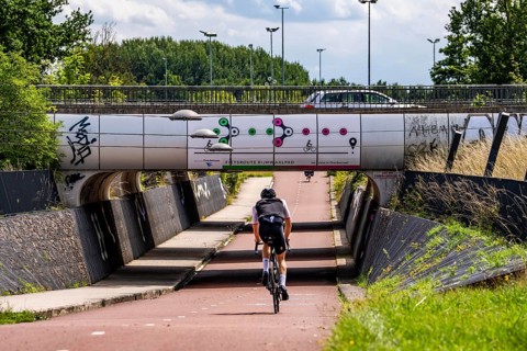 Rijnwaalpad long-distance cycle path, near the village of Elst, subway of the A15 motorway, wide