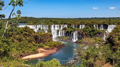 View of the impressive waterfalls with river, bridge and surrounding nature, The Iguazu Falls