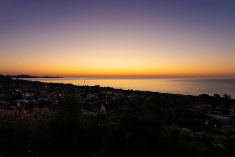 The sun rises on the Costa Rei, a stretch of coastline on the Italian Mediterranean island of